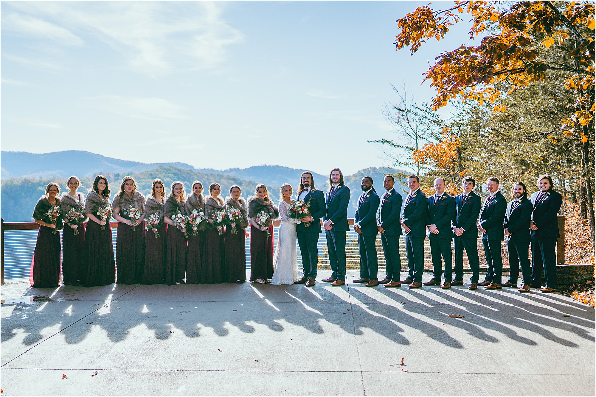 bridal party in burgundy and navy colors