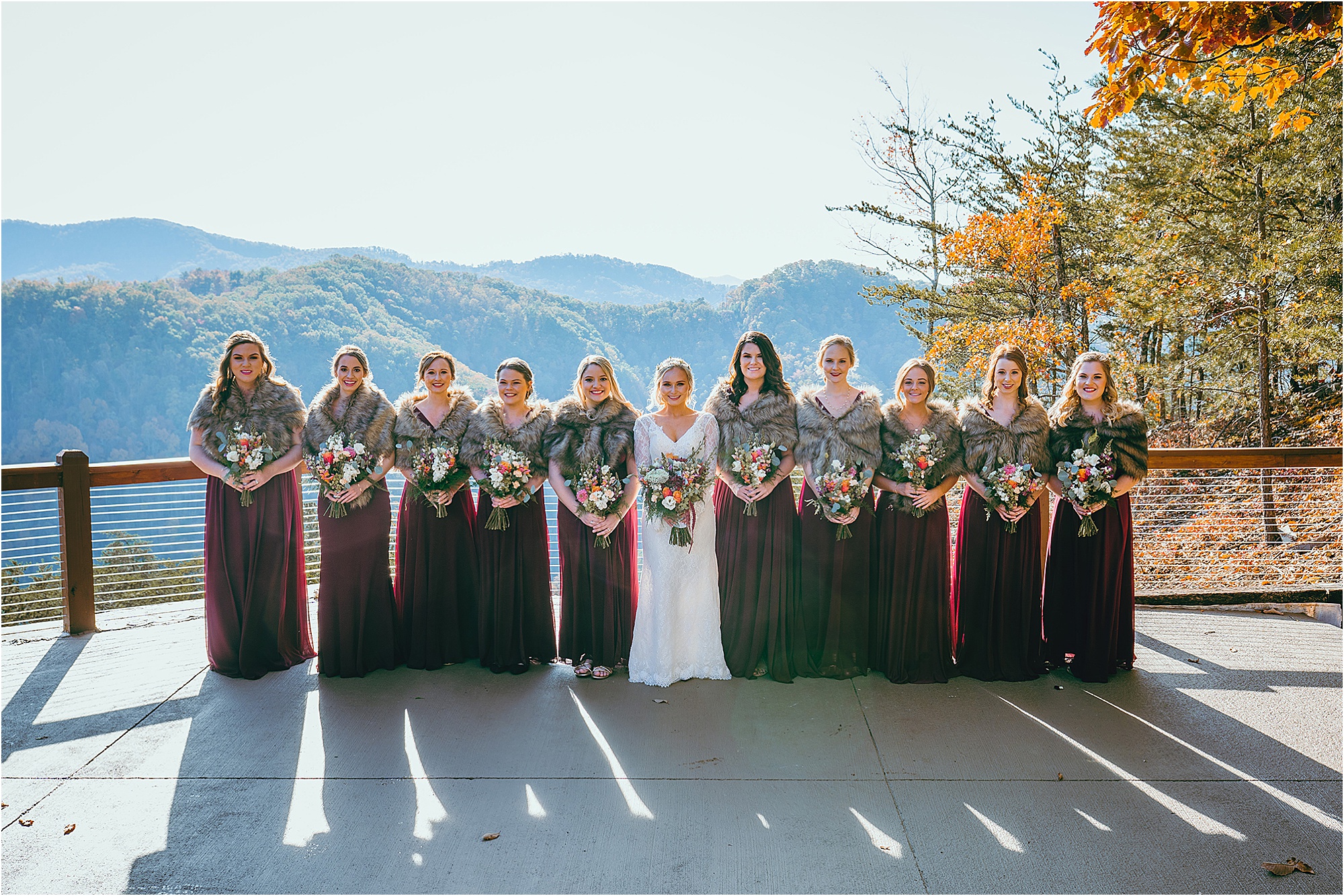 bridal party in burgundy and navy colors