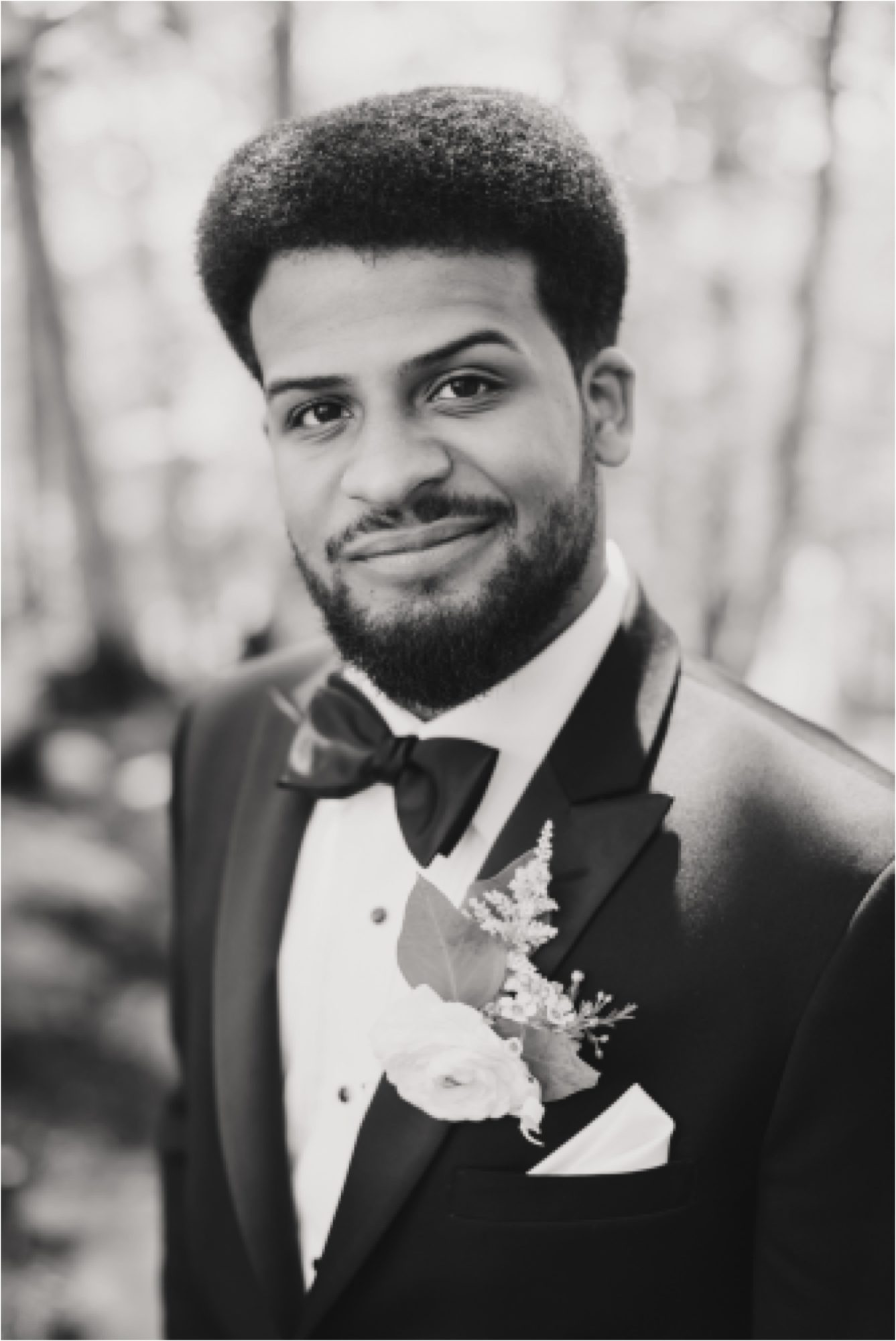 black and white groom portrait