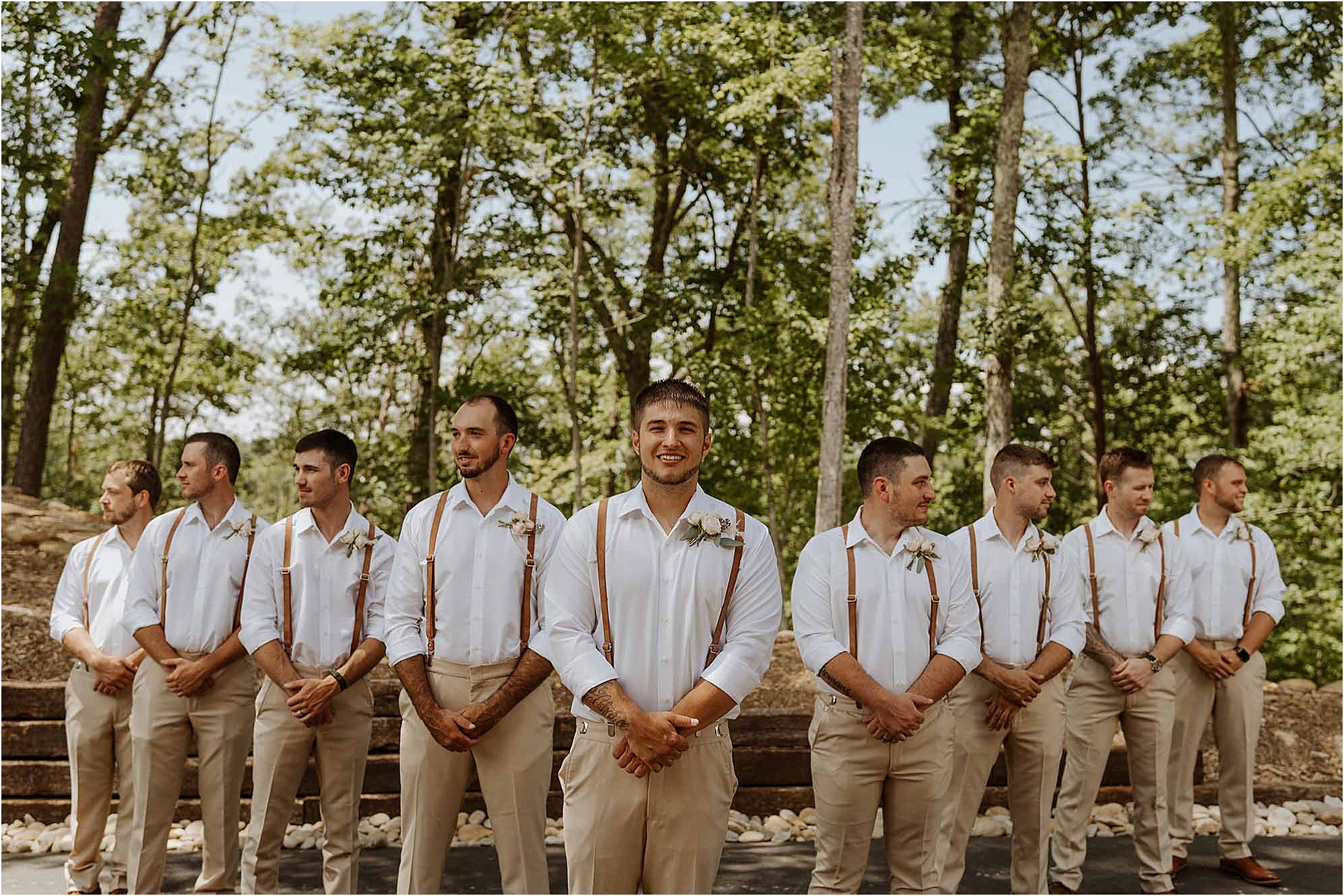 groom and groomsmen photo in woods