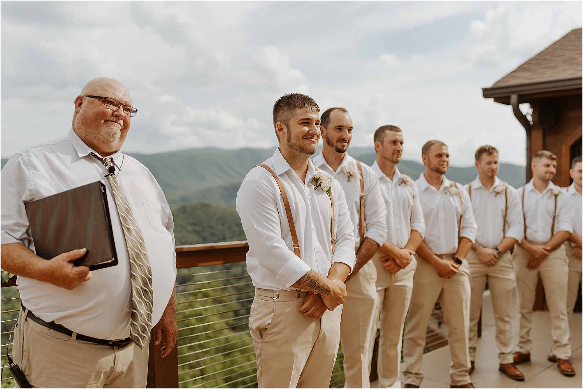 groom watching bride walk down aisle