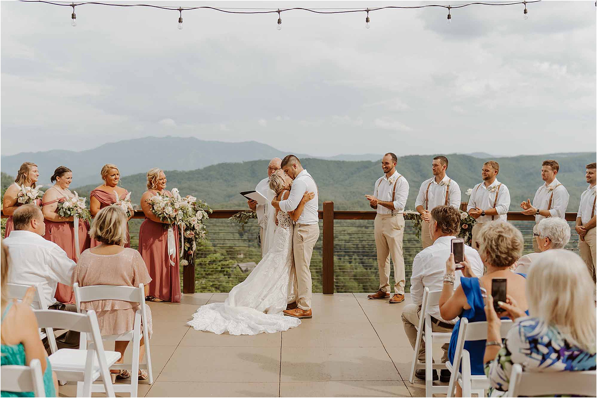 bride and groom kiss at summer wedding in Pigeon Forge