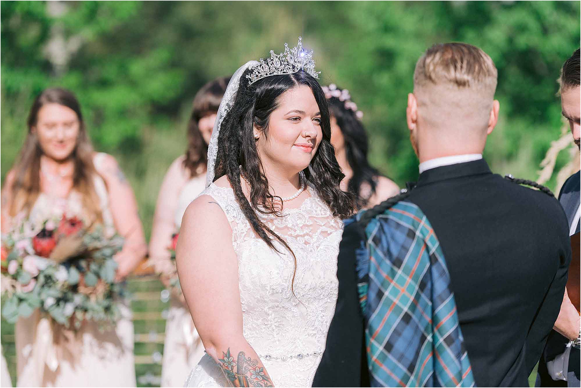 bride looking at groom during wedding ceremony