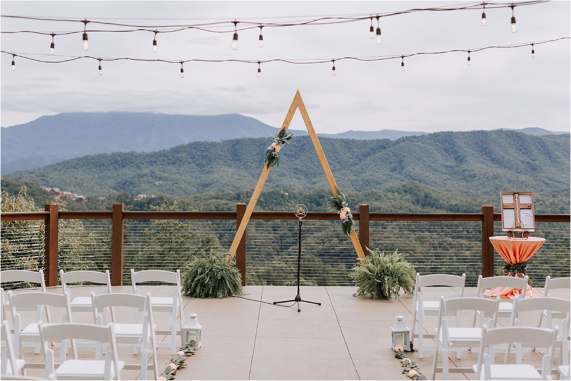 triangle wedding arbor with unique microphone