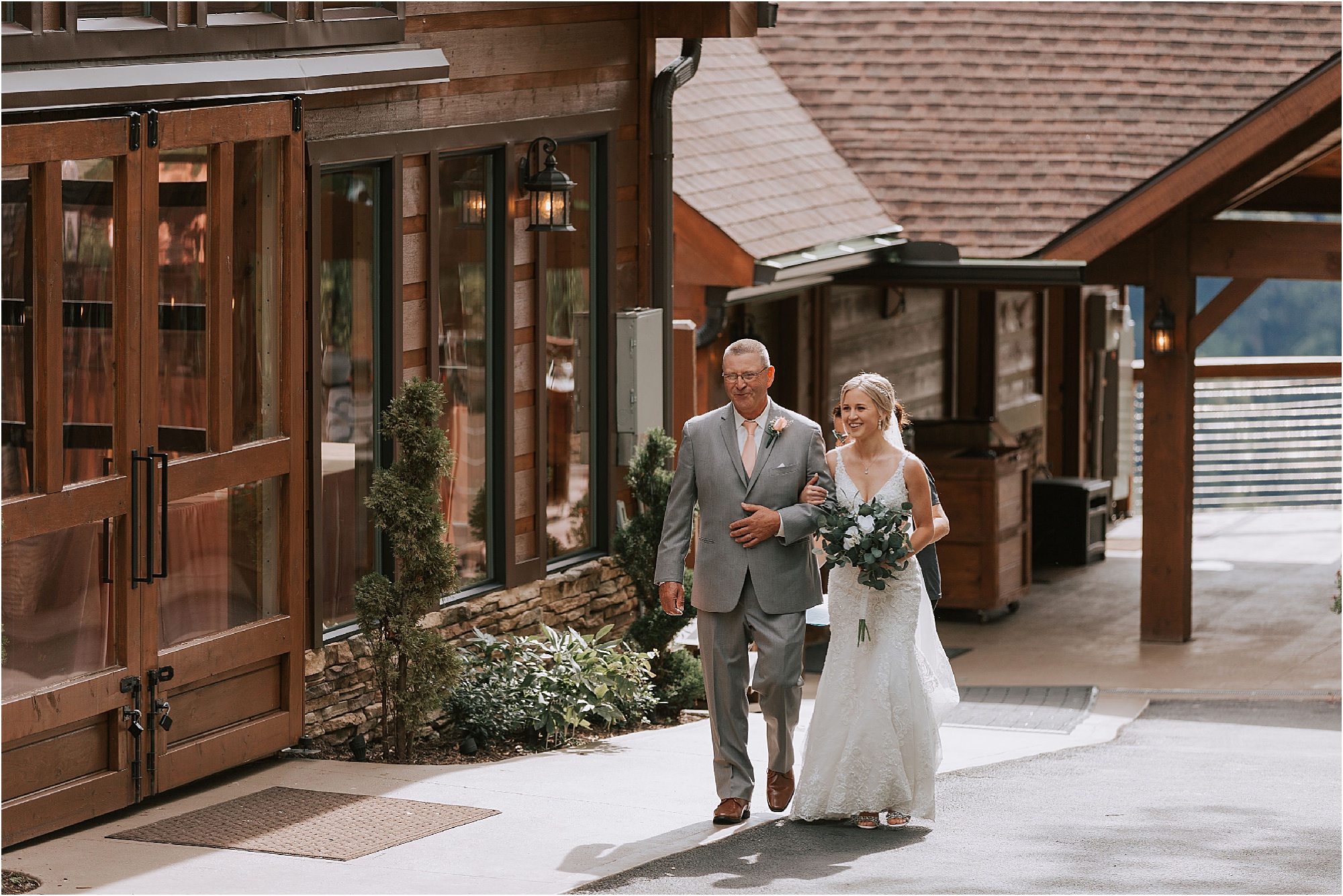 bride walking into wedding ceremony at The Magnolia Venue