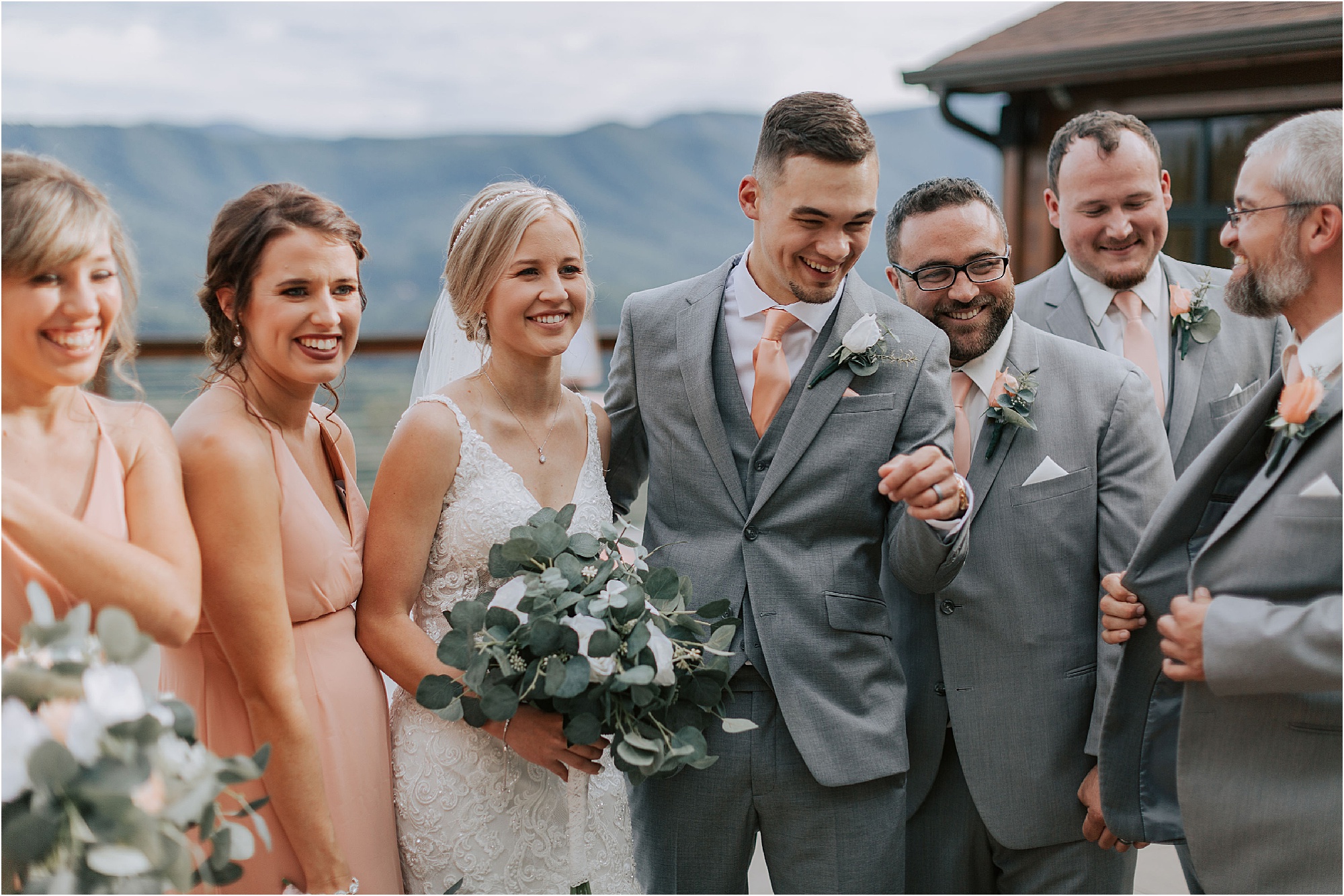 groom shows off wedding ring