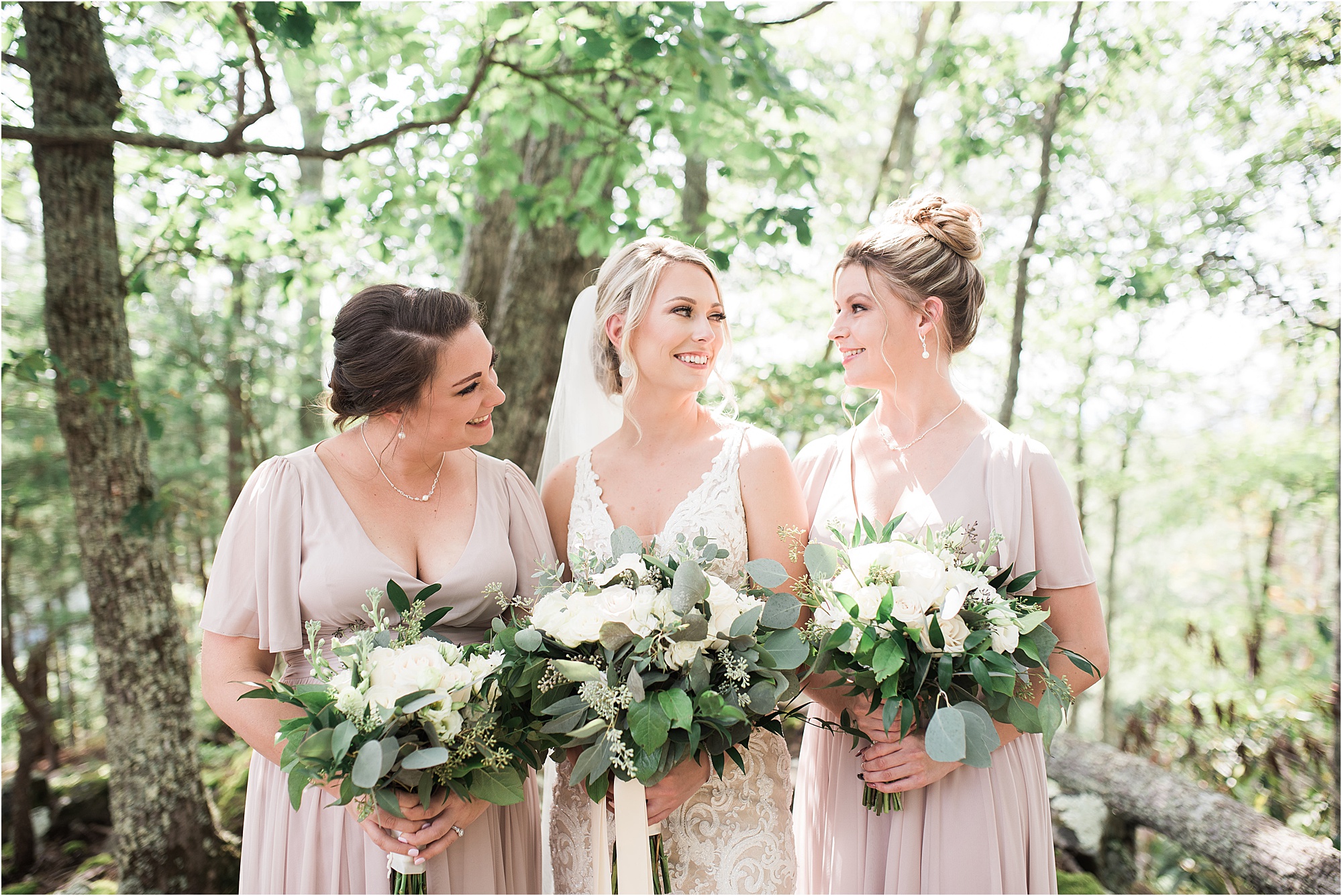 bride and bridesmaid photos in forest