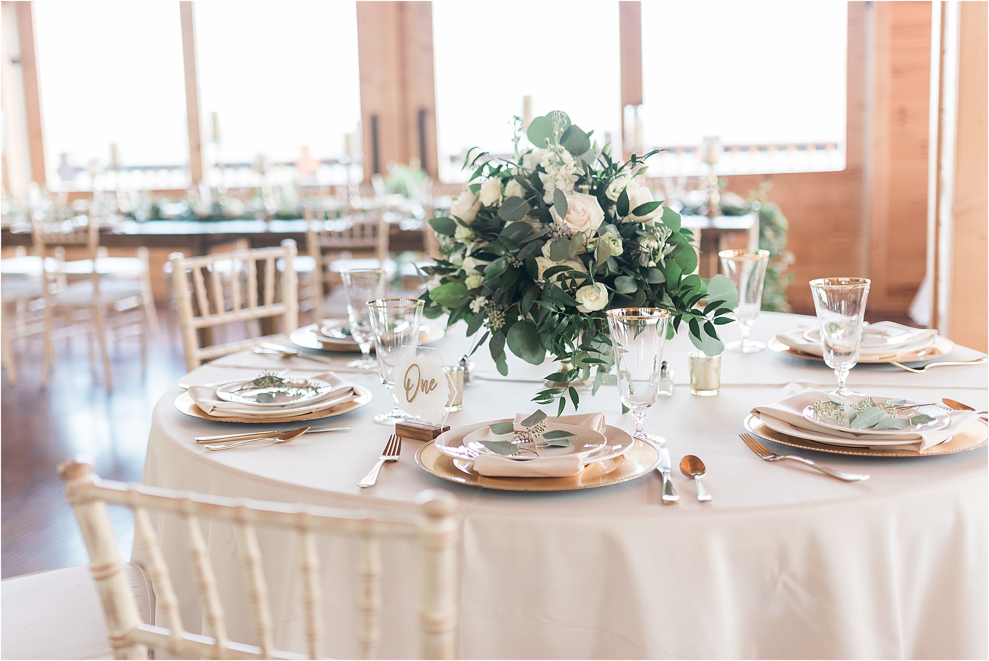 large greenery centerpiece at wedding reception