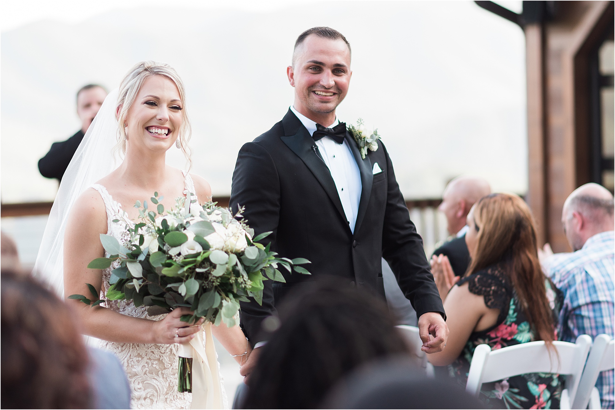 bride and groom exit wedding ceremony