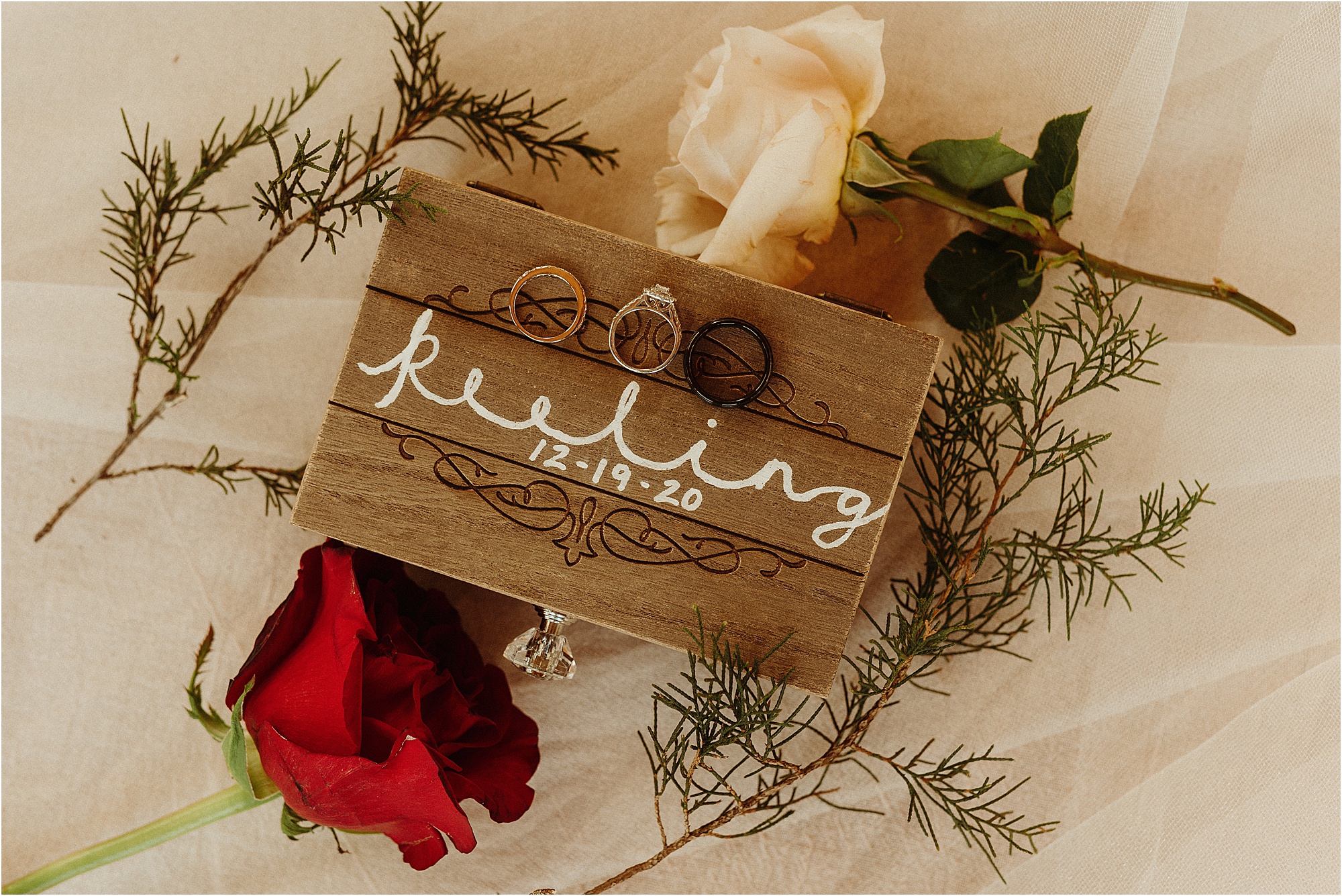 wedding rings on personalized ring box