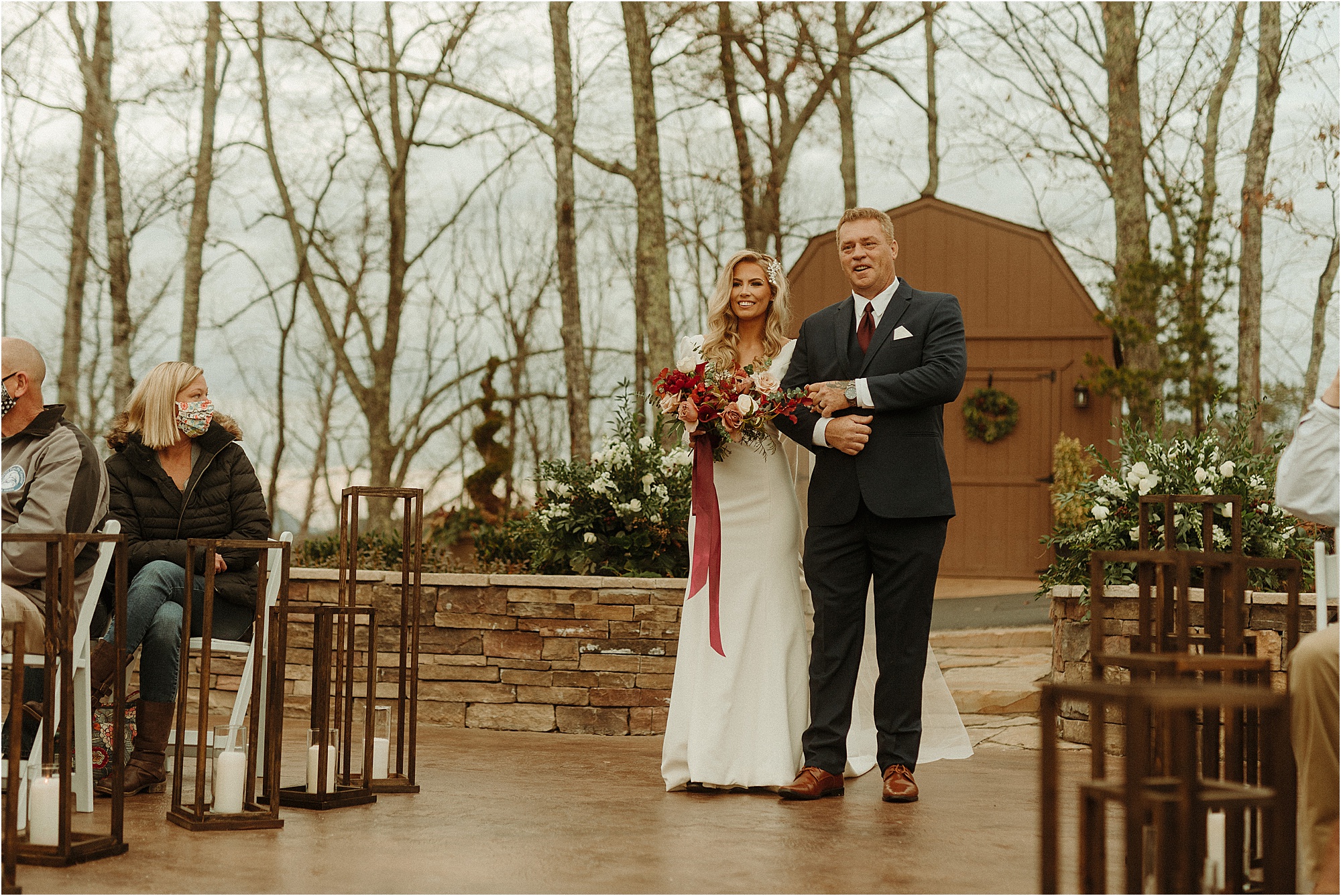 bride and father walk down the aisle at The Magnolia Venue