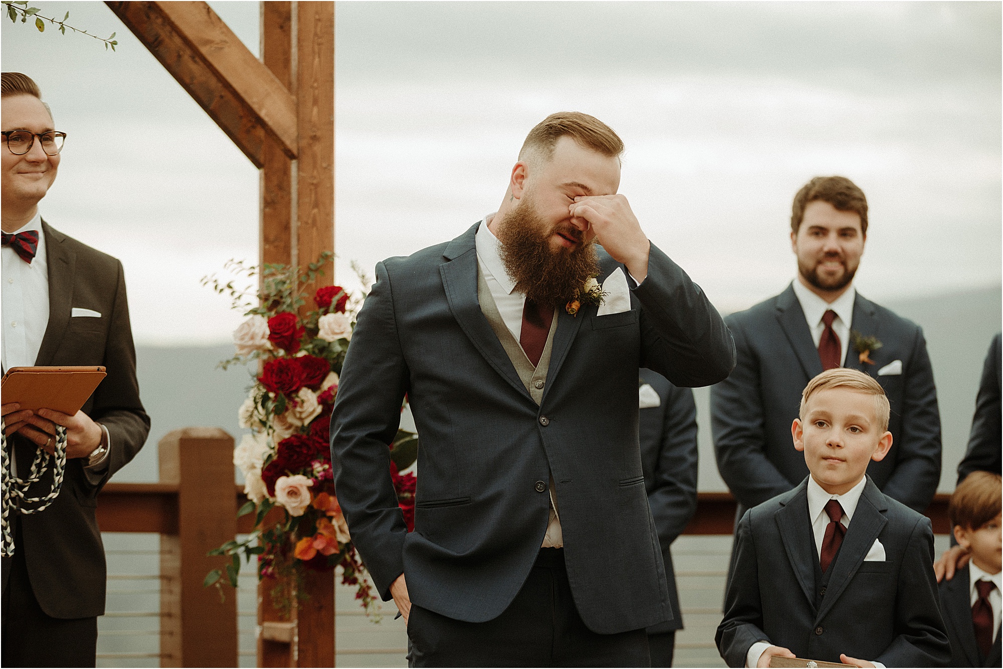 groom cries while watching bride walk down aisle