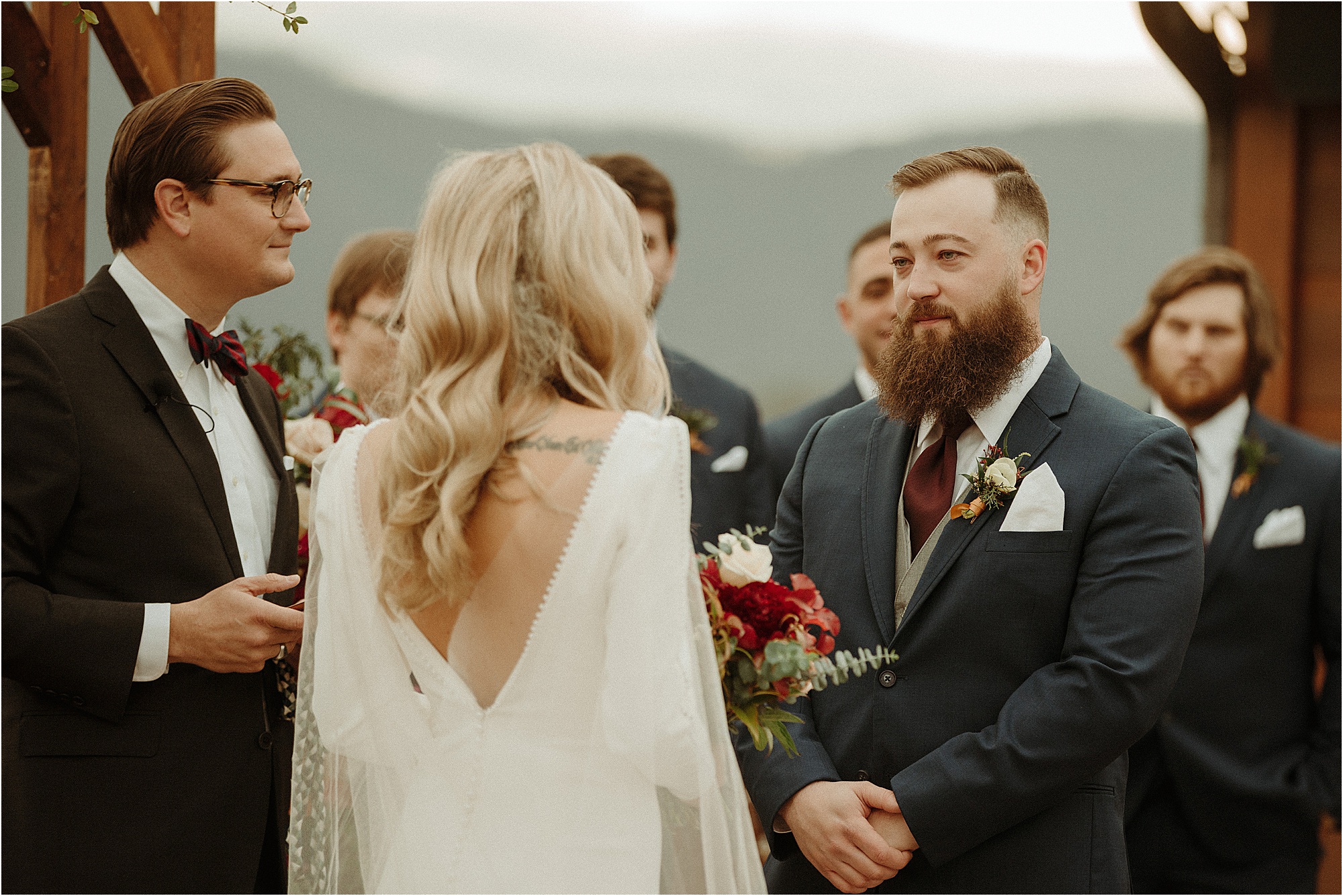 bride reads vows to groom at wedding ceremony