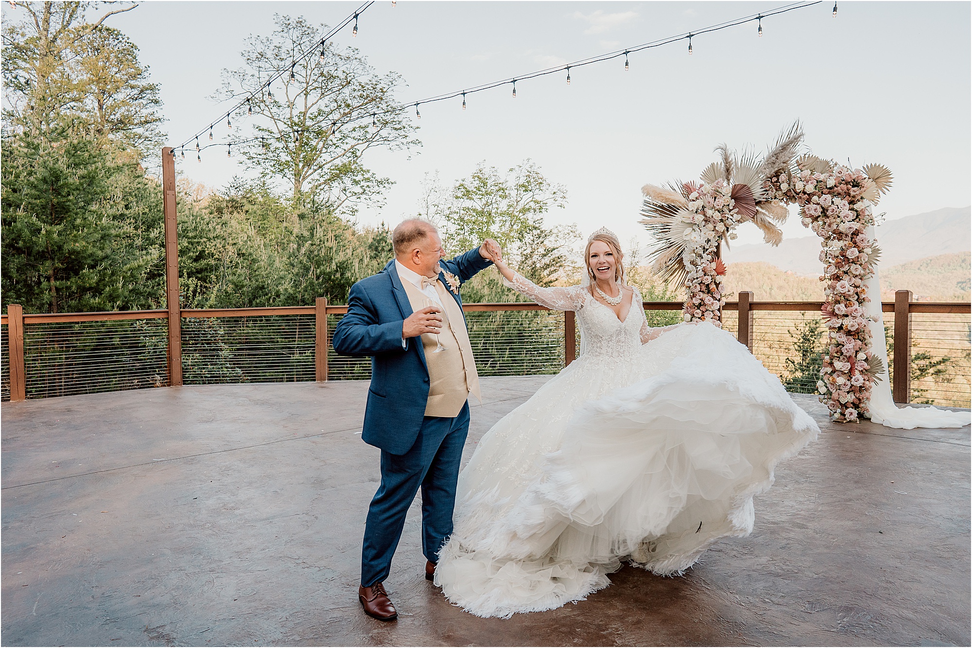 bride and groom dance on patio