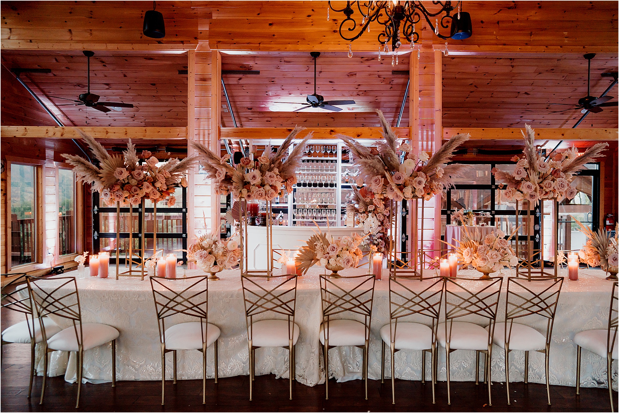 pink uplighting at luxury mountain wedding with Fairytale Theme