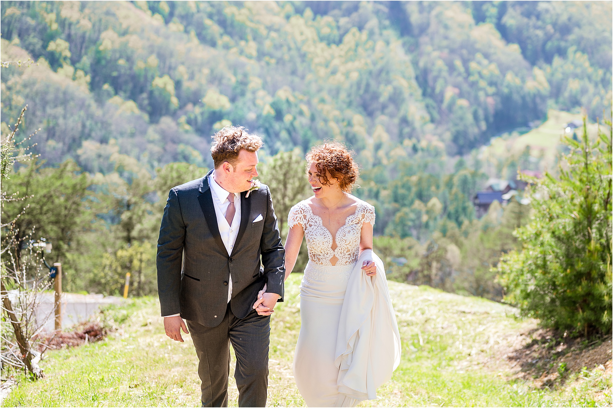 bride and groom walking in the Smoky Mountains