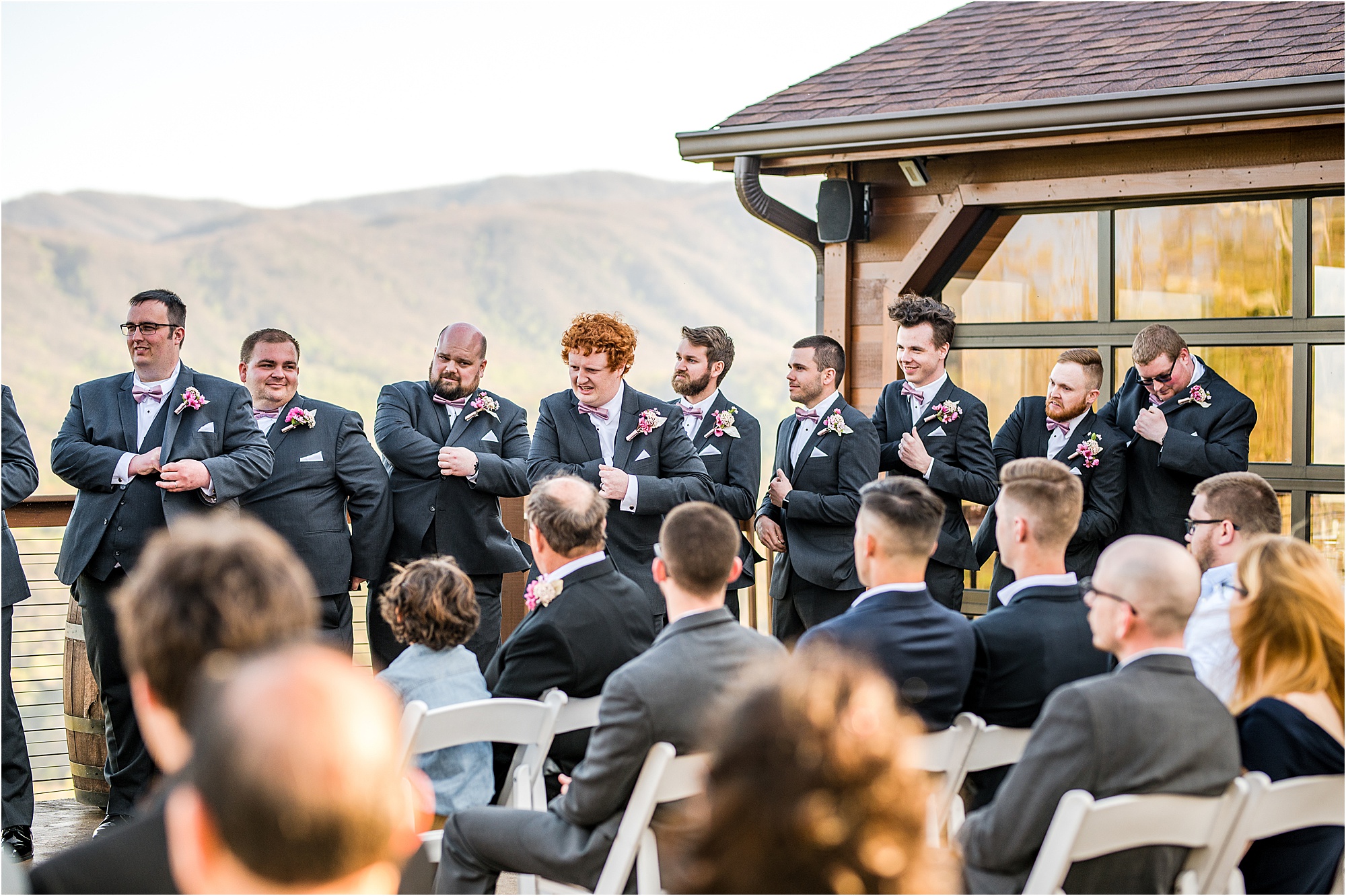 groomsmen trick at wedding ceremony