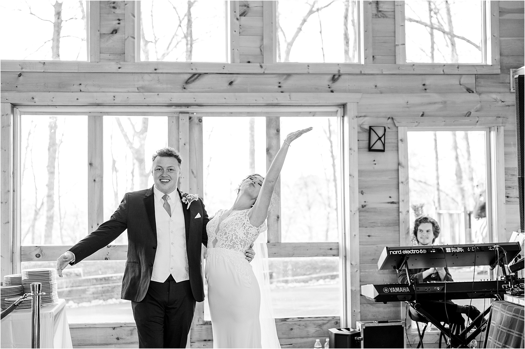 bride and groom enter reception in Grand Hall at The Magnolia Venue