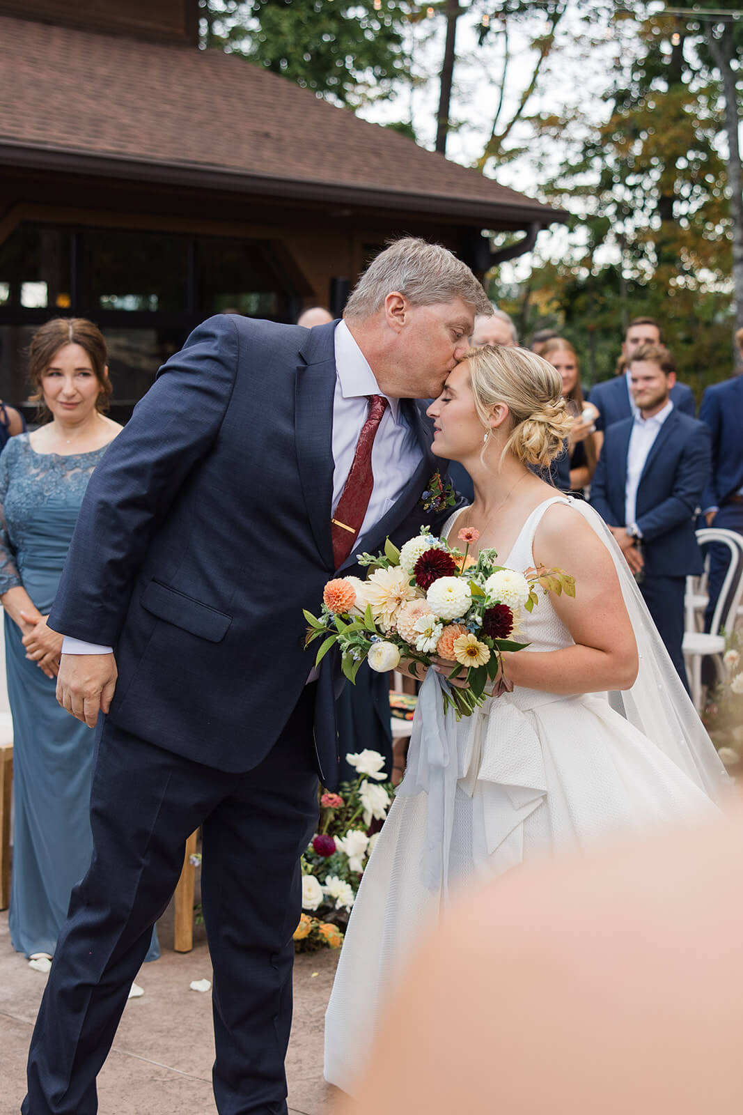 Father and Daughter sharing a sweet moment as he gives her away on her wedding day at The Magnolia Venue.