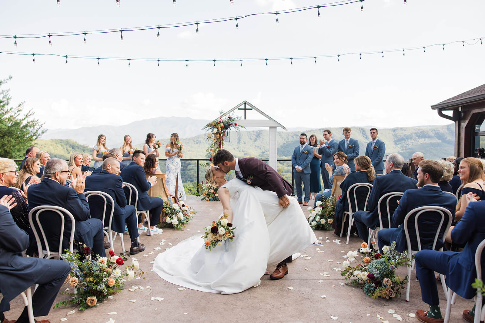 Guests seated for a personalized fall wedding ceremony at The Magnolia Venue, a luxury mountain venue