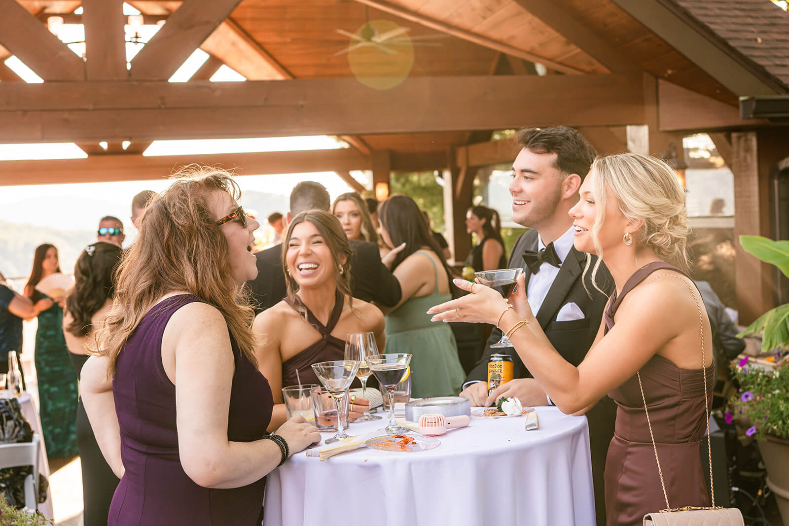 Cocktail hour the Husband and Wife share a cocktail on the cocktail patio of the Magnolia Venue located in Tennessee
