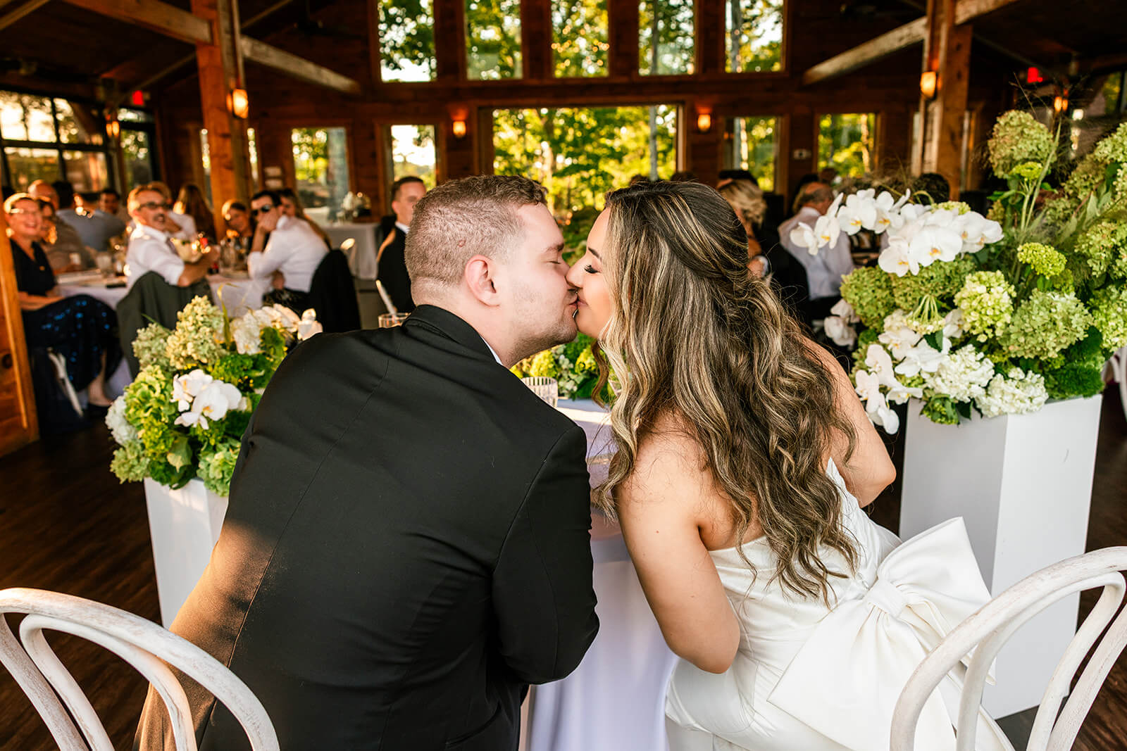 Guest in the grand hall of the Magnolia Wedding Venue. Modern Mountain Wedding in East Tennessee