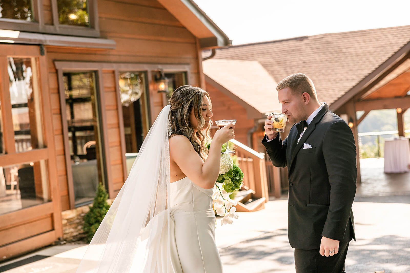 Cocktail hour the Husband and Wife share a cocktail on the cocktail patio of the Magnolia Venue located in Tennessee
