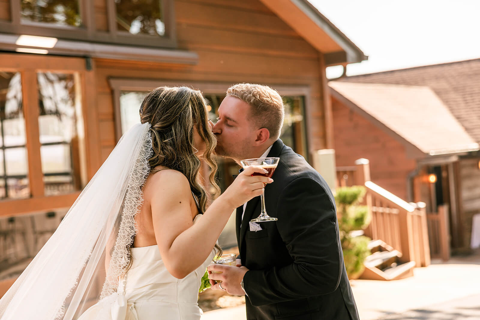 Cocktail hour the Husband and Wife share a cocktail on the cocktail patio of the Magnolia Venue located in Tennessee
