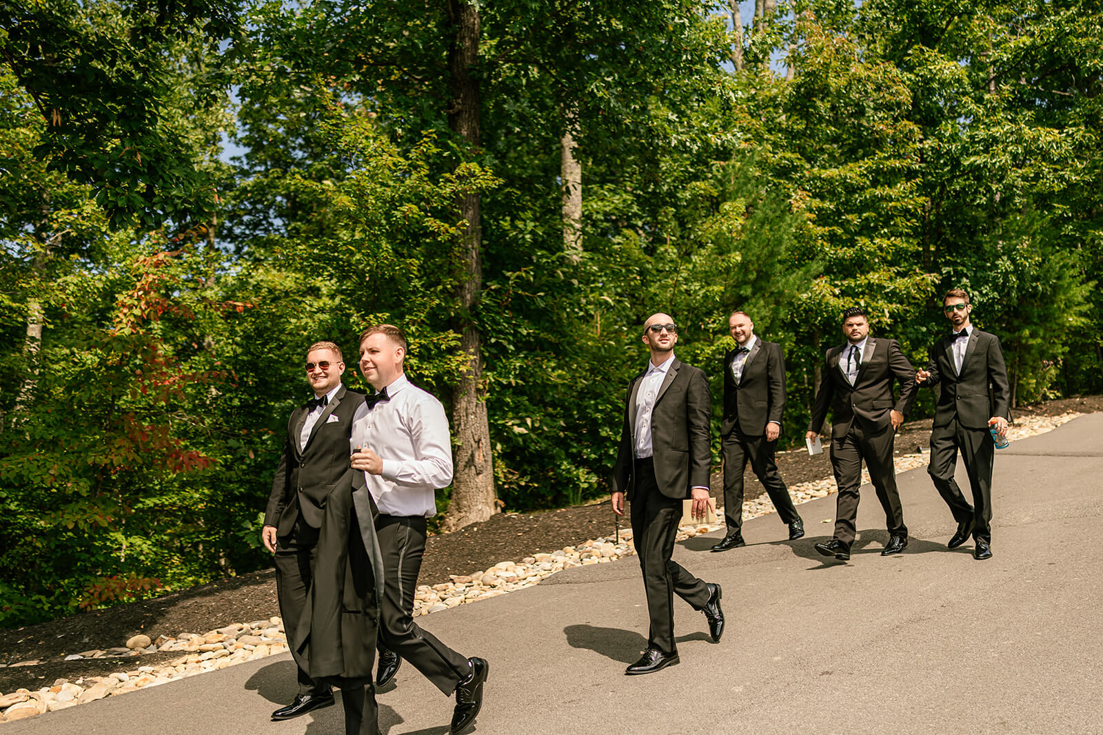 Groomsmen arriving to the wedding at The Magnolia Venue up the driveway